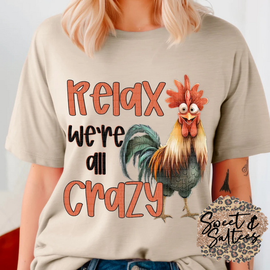 Relax, we’re all crazy t-shirt