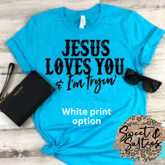 Jesus loves you and I’m tryin’ WHITE print Graphic T-shirt deal