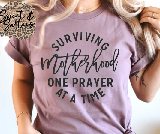 Surviving Motherhood One Prayer at a Time Graphic T-shirt