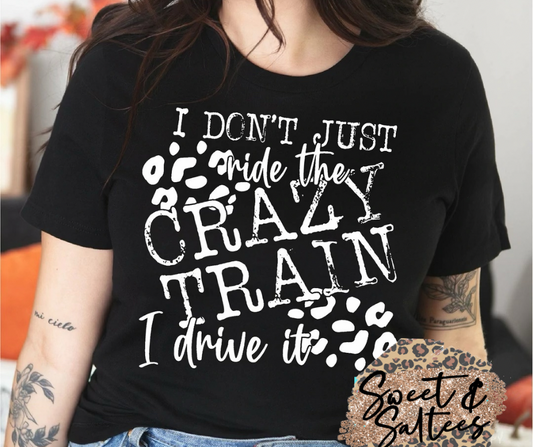 I Don’t Just Ride the Crazy Train, I Drive It Graphic T-shirt